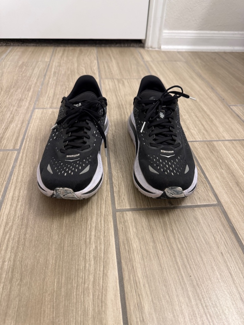 Hoka Black and White Performance Running Shoes - Picture 2 of 5